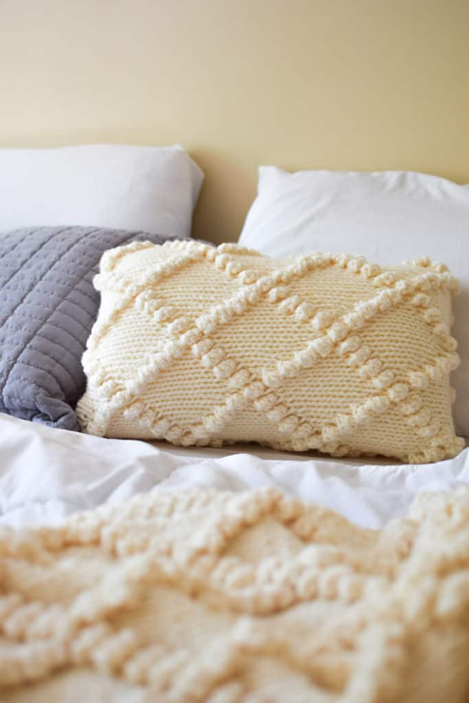 Bobble Knit Throw Pillow - click for the free pattern and tutorial from www.kniftyknittings.com! #yarnspirations #knitting #knittingpatterns