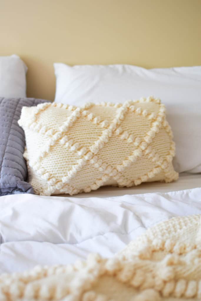 Bobble Knit Throw Pillow - click for the free pattern and tutorial from www.kniftyknittings.com! #yarnspirations #knitting #knittingpatterns