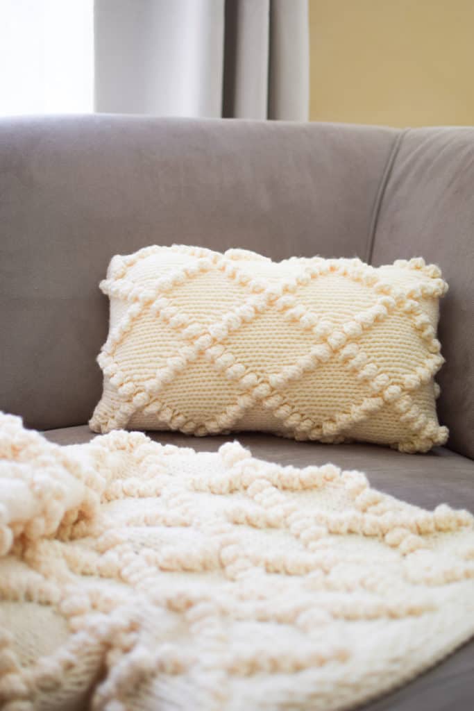 Bobble Knit Throw Pillow - click for the free pattern and tutorial from www.kniftyknittings.com! #yarnspirations #knitting #knittingpatterns