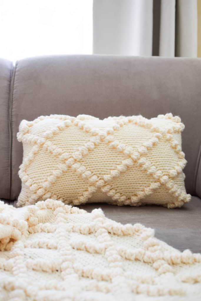 Bobble Knit Throw Pillow - click for the free pattern and tutorial from www.kniftyknittings.com! #yarnspirations #knitting #knittingpatterns