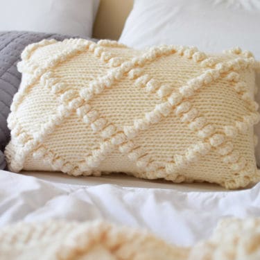 Bobble Knit Throw Pillow - click for the free pattern and tutorial from www.kniftyknittings.com! #yarnspirations #knitting #knittingpatterns