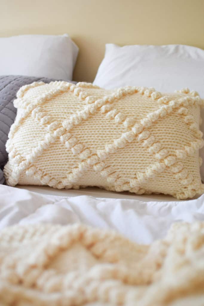 Bobble Knit Throw Pillow - click for the free pattern and tutorial from www.kniftyknittings.com! #yarnspirations #knitting #knittingpatterns