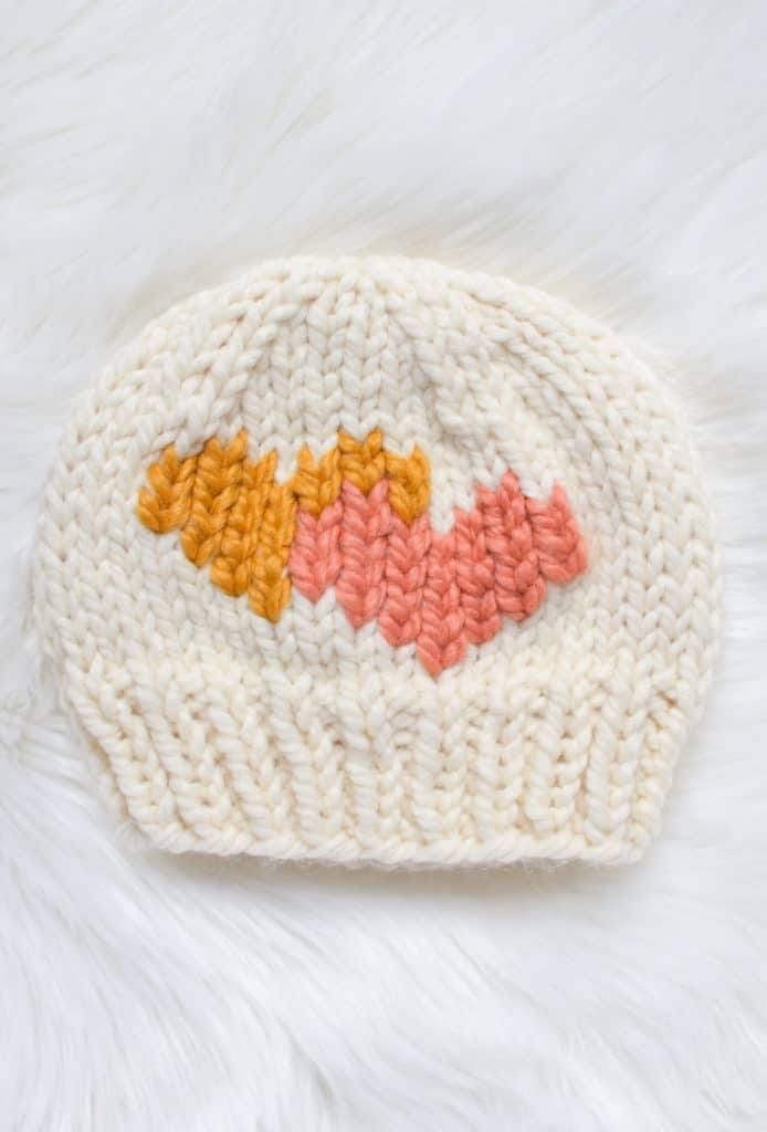 Duplicate Stitch Heart Tutorial - how to add a duplicate stitch heart to your knits! Free graph and video tutorial from www.kniftyknittings.com #knitting #knittingtutorial #valentinesknits